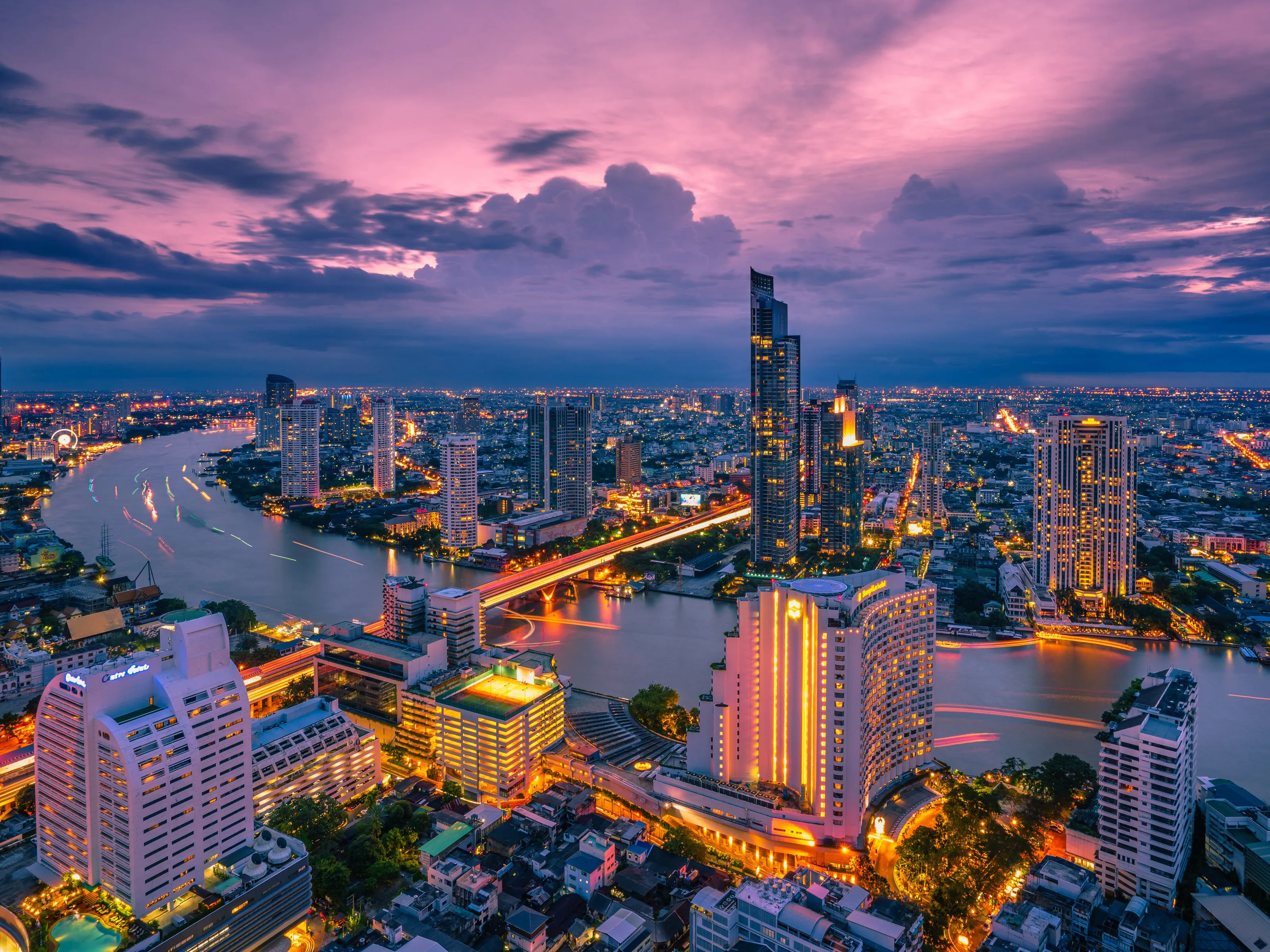 Bangkok skyline and river at sunset