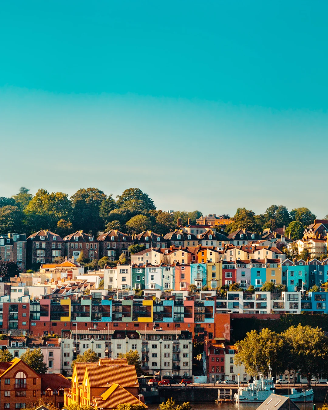 Colourful hillside homes in Bristol above the harbour