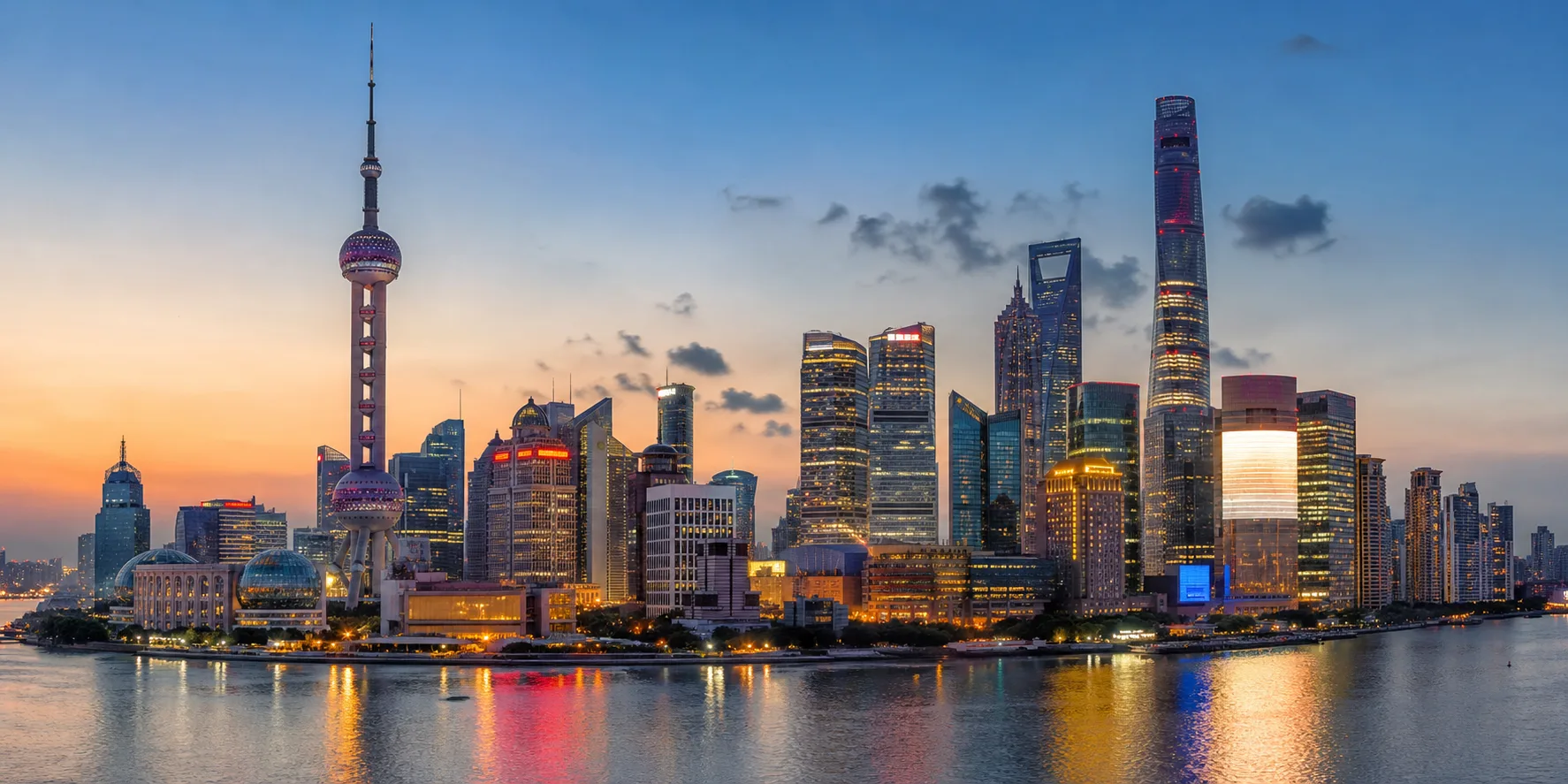 Shanghai skyline beside the Huangpu River at dusk