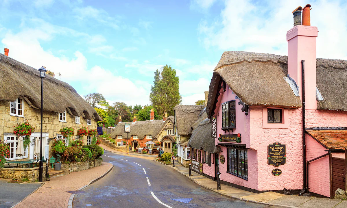 Thatched cottages on a Hampshire village road