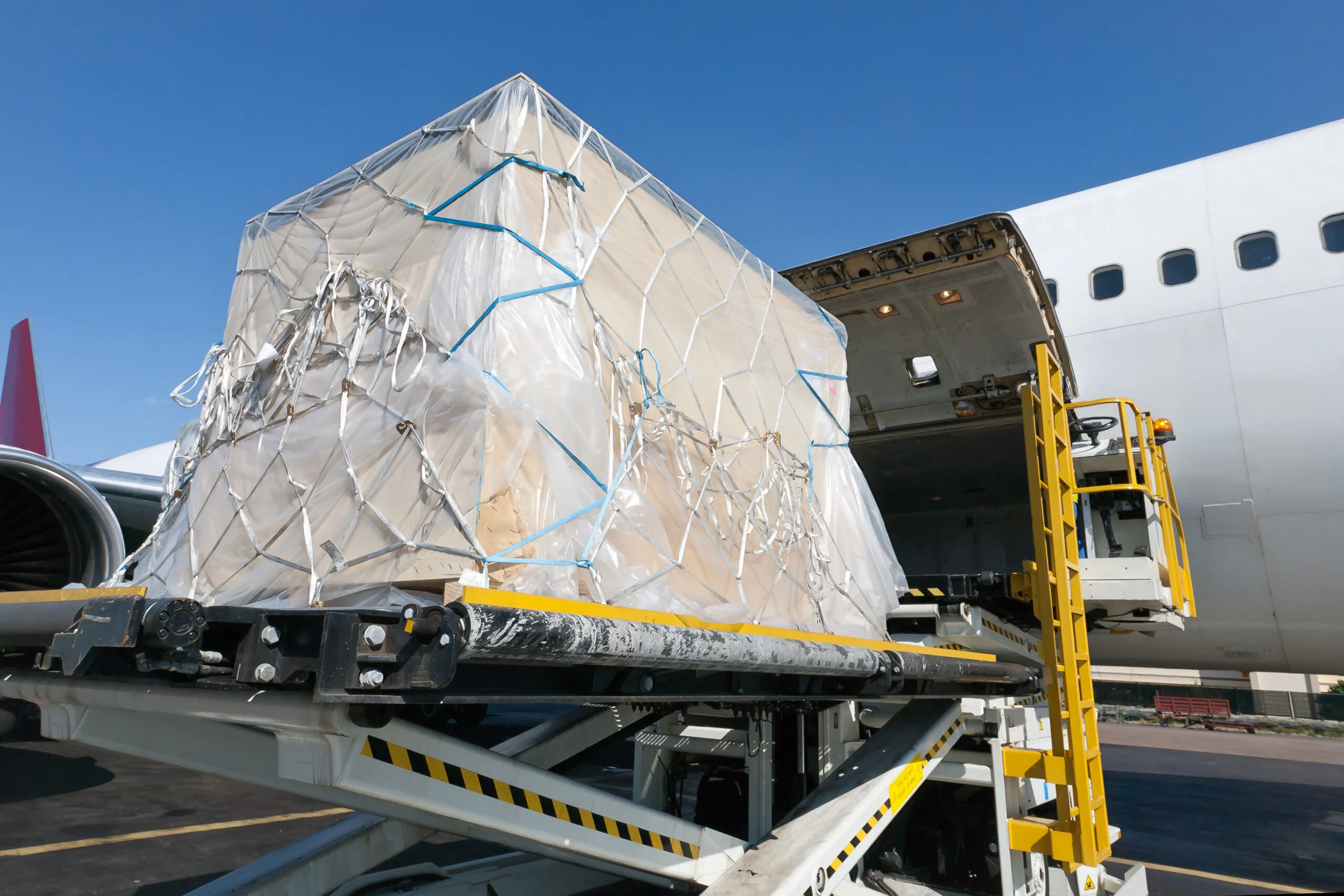 Large export consignment being loaded into a cargo aircraft