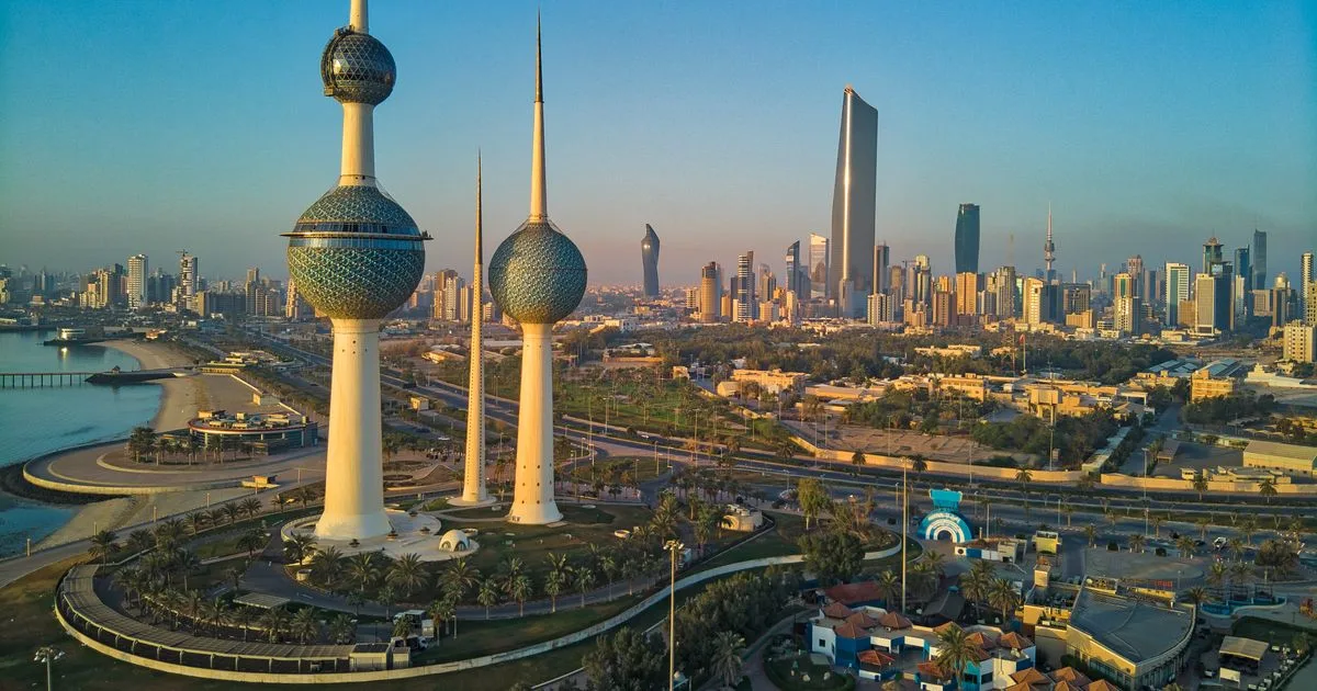 Kuwait Towers and Kuwait City skyline at sunset