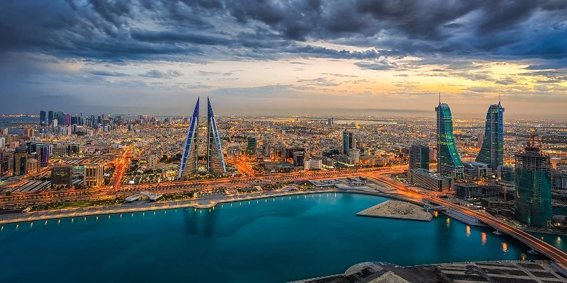 Manama skyline and waterfront at sunset