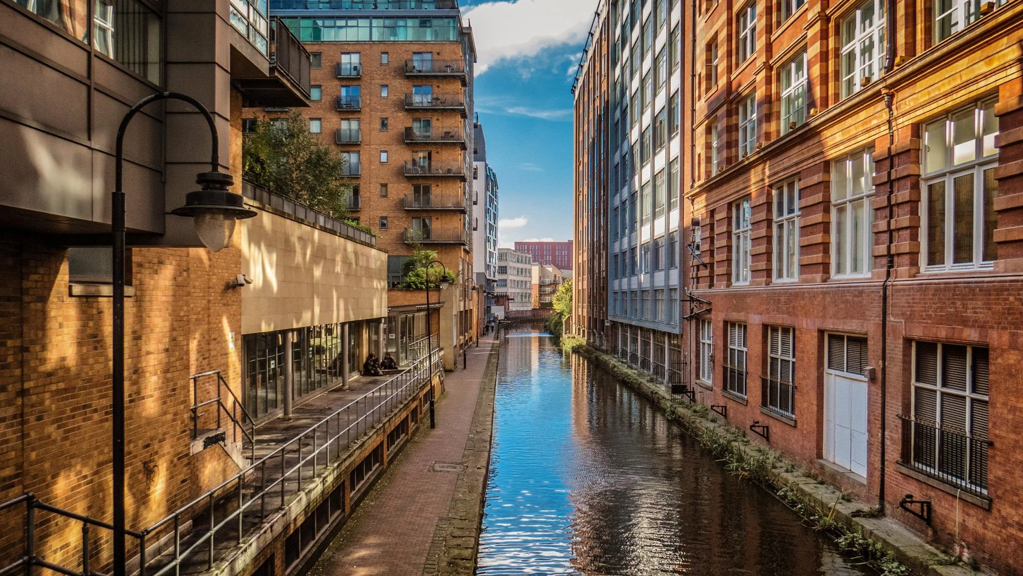 Manchester canal quarter with brick buildings and waterside apartments