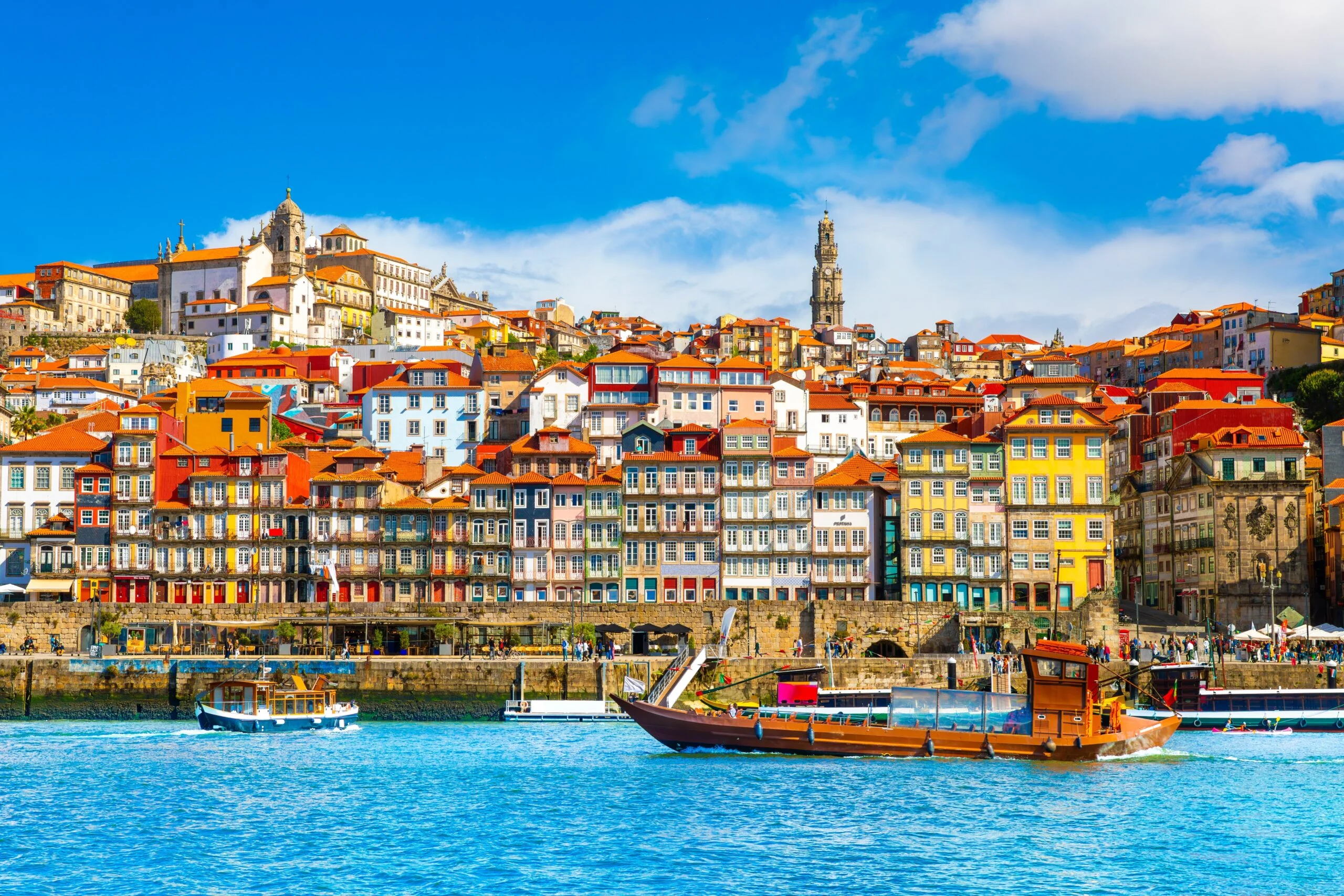 Porto Ribeira waterfront with colourful houses and boats