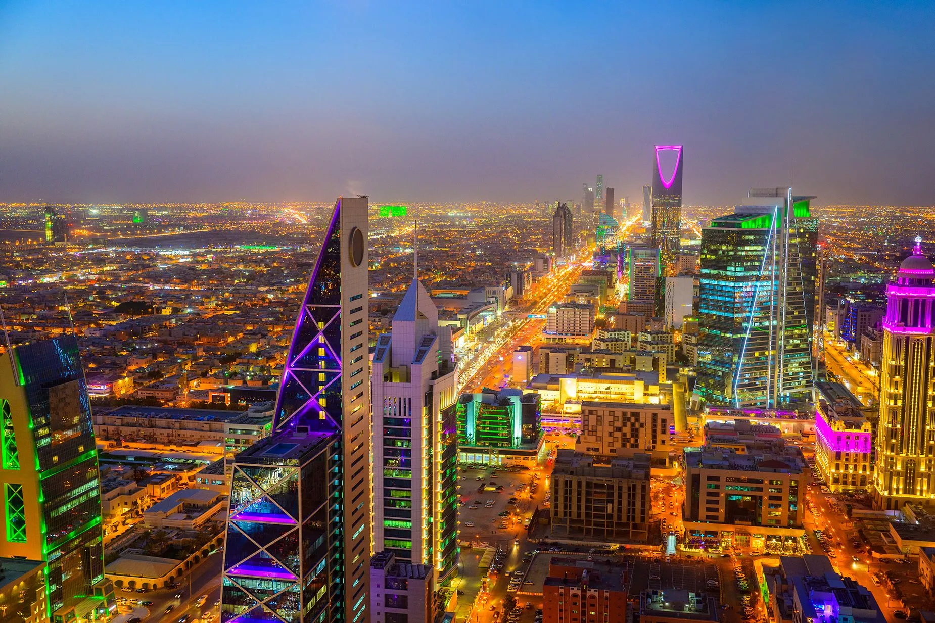 Riyadh skyline at night with the Kingdom Centre tower