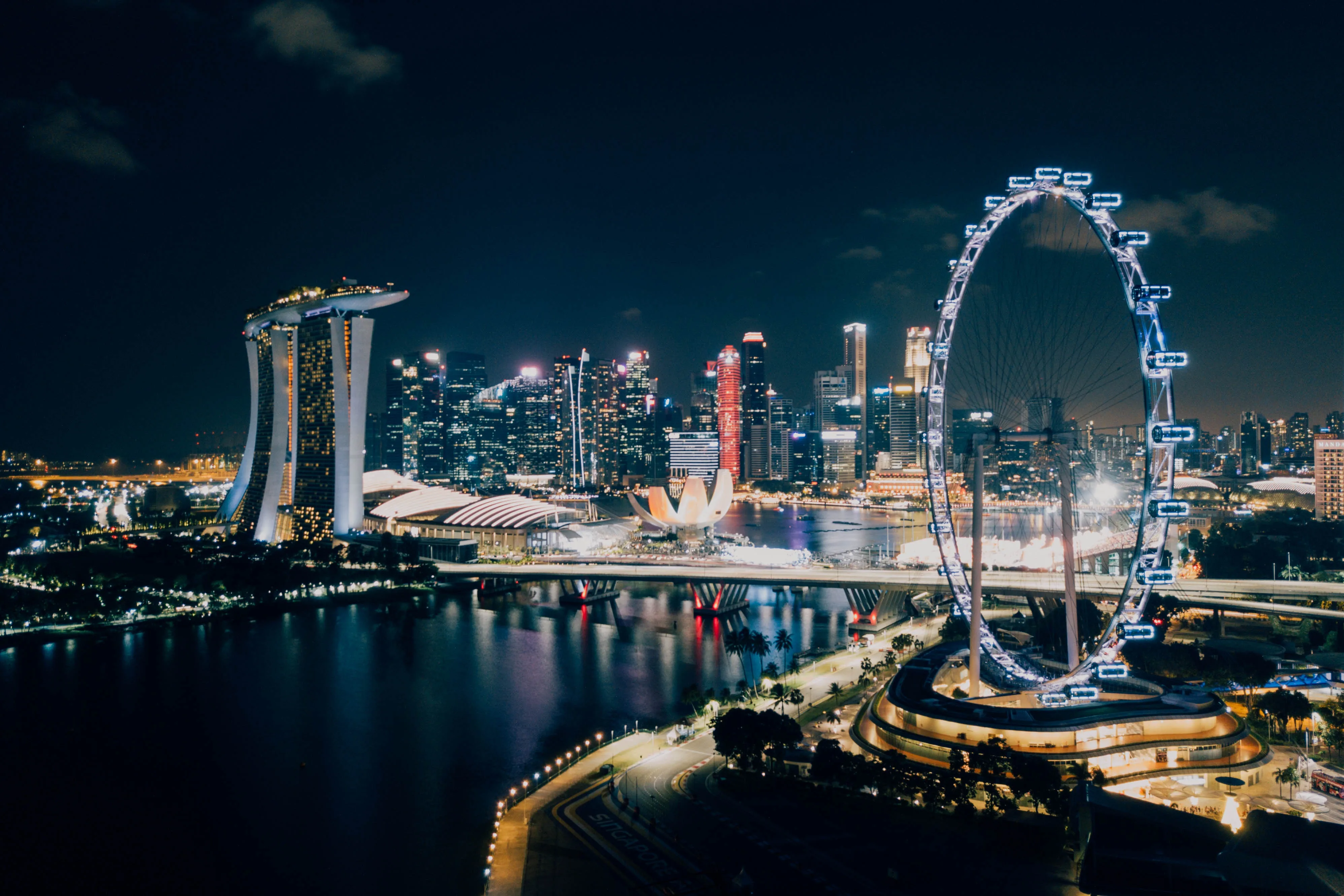Singapore night skyline with the Singapore Flyer and Marina Bay Sands